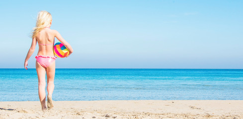 Little girl  on the sea