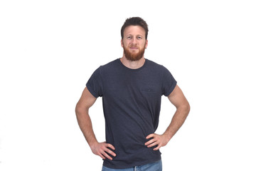 portrait of a man hands on waist and smiling on white