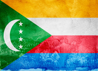 Watercolor flag on background. Comoros