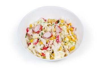 Salad of crab sticks with vegetables in bowl