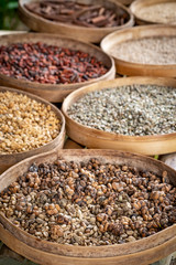 Various varieties of Luwak coffee beans on a production plantation, Bali, Indonesia