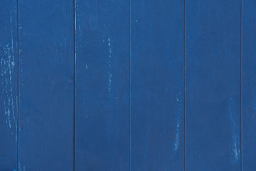 Background and texture of old boards painted in blue
