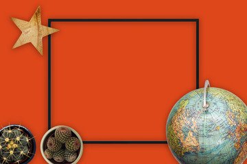 Flat lay top view World travel concept with red background and black frame