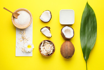 Composition with different coconut products on color background