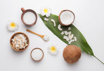 Fototapeta na wymiar Composition with different coconut products on light background