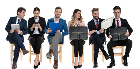 Obraz premium Team of 6 businessmen waiting for a job interview