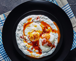 cilbir, poached eggs in dill yogurt sauce
