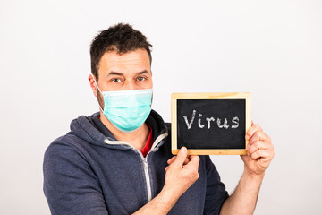 man with a mouthguard with blackboard isolated against white background and text virus