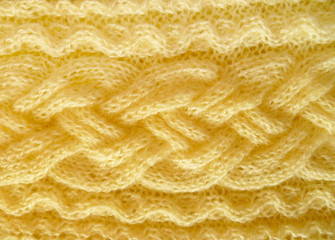 Knitted homemade fabric texture. Knitted background pattern. Modern knitwear fabric texture. Geometric decorative texture. Simple design background.