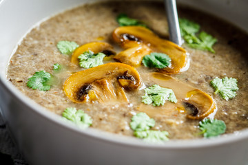 Mushroom soup puree with cilantro. Healthy vegetarian food concept.