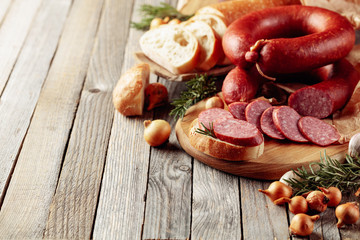 Bread and smoked sausage.