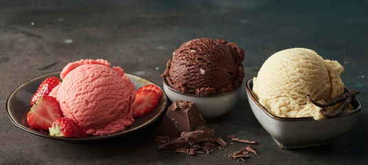 Scoops of chocolate, berry and vanilla ice-cream