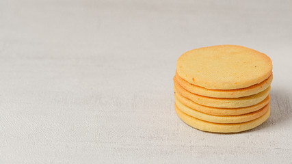 Stack of homemade cookies on a grey background. Close up. Macro photo