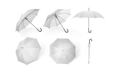 collection of white umbrellas isolated on a white background  mock up