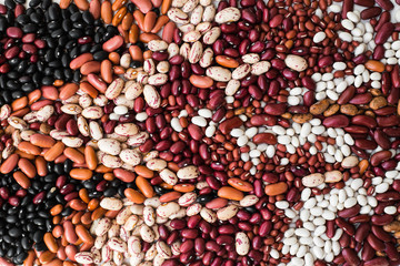 Different varieties of bean seeds. Beans background. - 323634095
