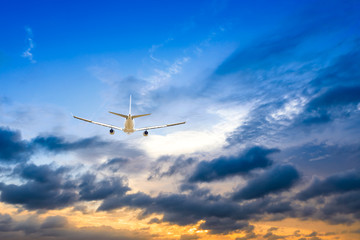 Fototapeta na wymiar High-altitude airplane and beautiful sky at dusk