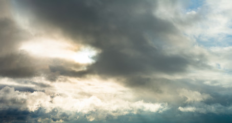 Fantastic dark thunderclouds at sunrise