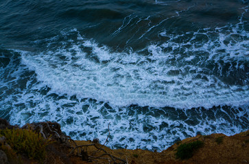 Waves at rocky beach