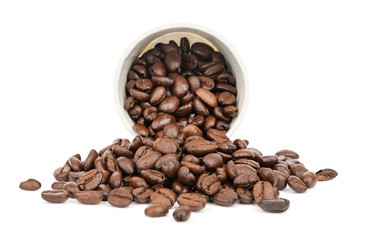 Coffee beans scattering from a paper cup