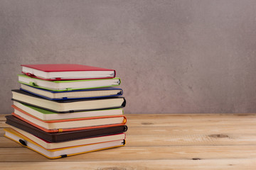 notepad or paper notebook at wooden table