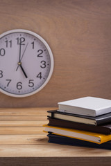 notepad or paper notebook at wooden table