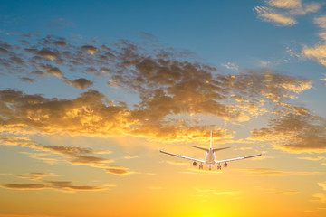 High-altitude airplane and beautiful sky at dusk