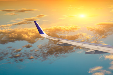 High-altitude airplane and beautiful sky at dusk