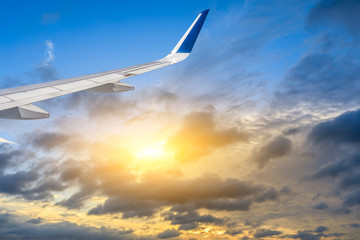 Fototapeta premium High-altitude airplane and beautiful sky at dusk