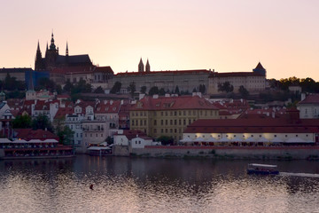 Evening landscape of the Vltava river and Prague Castle in Old Prague. Beautiful sunset.