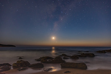 Milky Way and Crescent Moon over the Sea