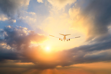 High-altitude airplane and beautiful sky at dusk