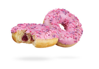 red glazed round donut with sprinkles isolated. Side view