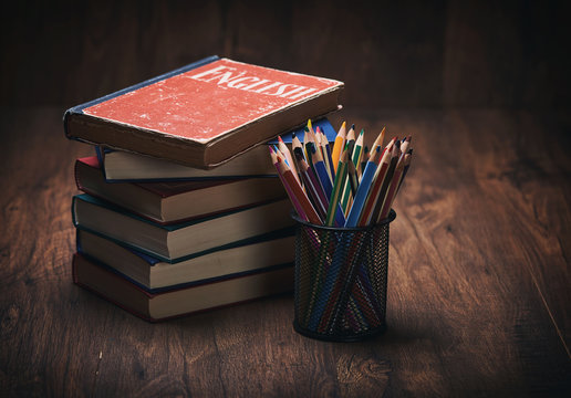 Learning English Concept. Book On A Wooden Table