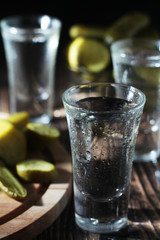 Three shots with vodka and pickled cucumbers	