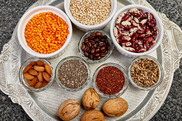Beans and nuts selection in bowls. Healthy food