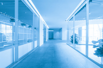 Empty floor tile and glass window in art center interior space
