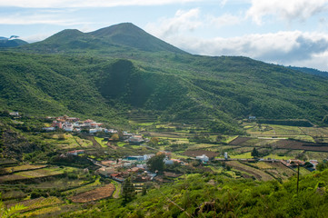 Fototapeta na wymiar Picturesque green valley among the mountains.