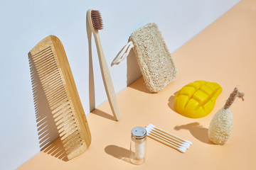 Zero waste concept. Biodegradable Eco-friendly hygiene items: toothbrush, floss, comb, loofah...