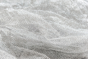 Obraz premium abstract background of silver mesh fabric close up