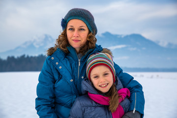 Fototapeta na wymiar Mother and Daughter making memories in winter