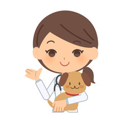 説明をする獣医と犬