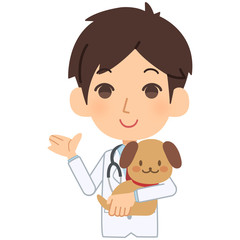 説明をする獣医と犬