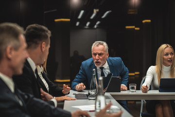 The people talking to each other on business conference