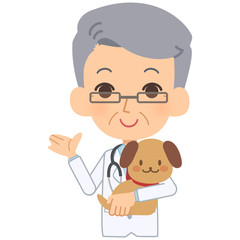 説明をする獣医と犬