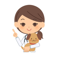 説明をする獣医と犬