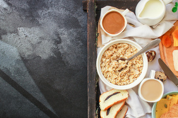 breakfast (oatmeal porridge, dairy products and more, snack) menu concept background. top view. copy space