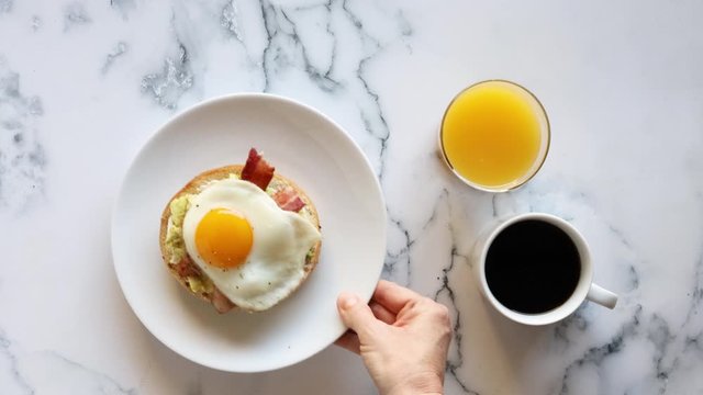 Serving an Avocado Breakfast Bagel