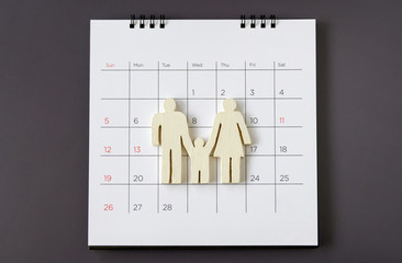 white icon family on calendar, Family concept