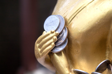 The Buddha that many people are respected in Thailand. , People who believe in making merit by...