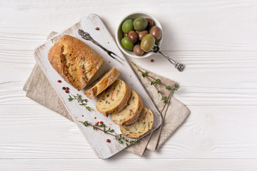 Healthy bread with olive and vintage forks